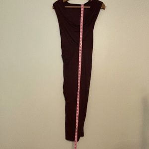 Stunning asymmetrical draped dress with slight cowl neck in a deep burgundy